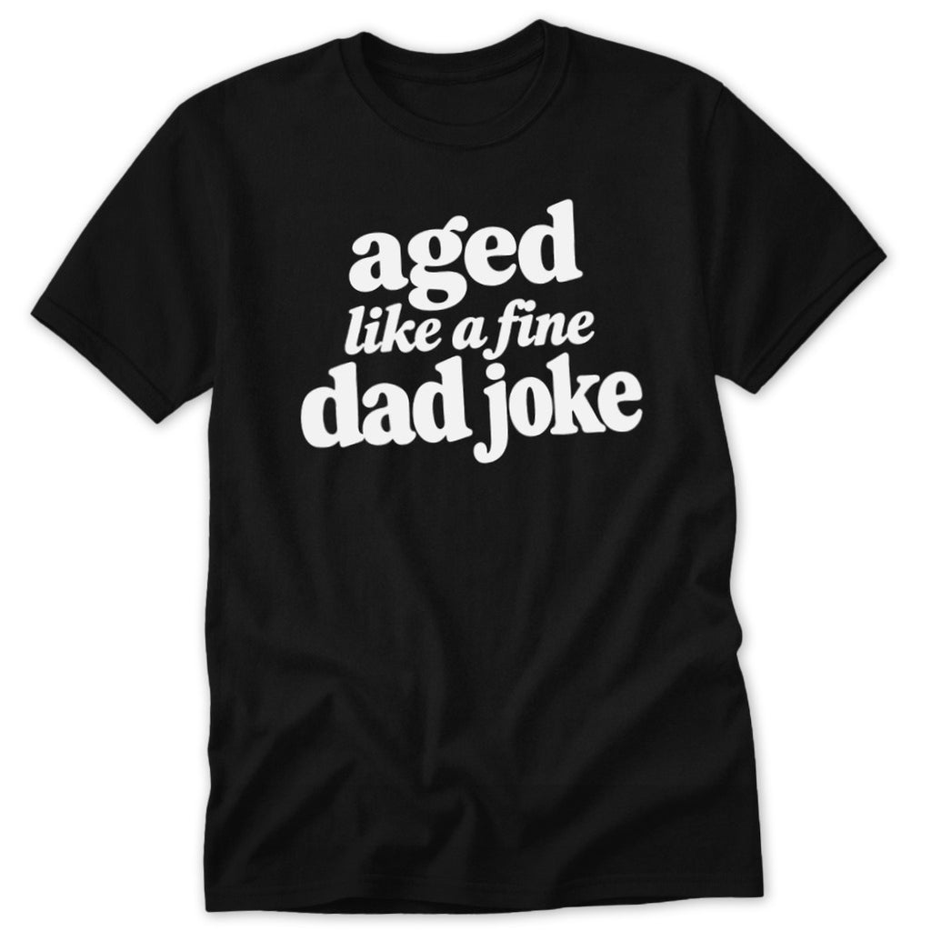 Black short-sleeved t-shirt with white text that reads aged like a fine dad joke