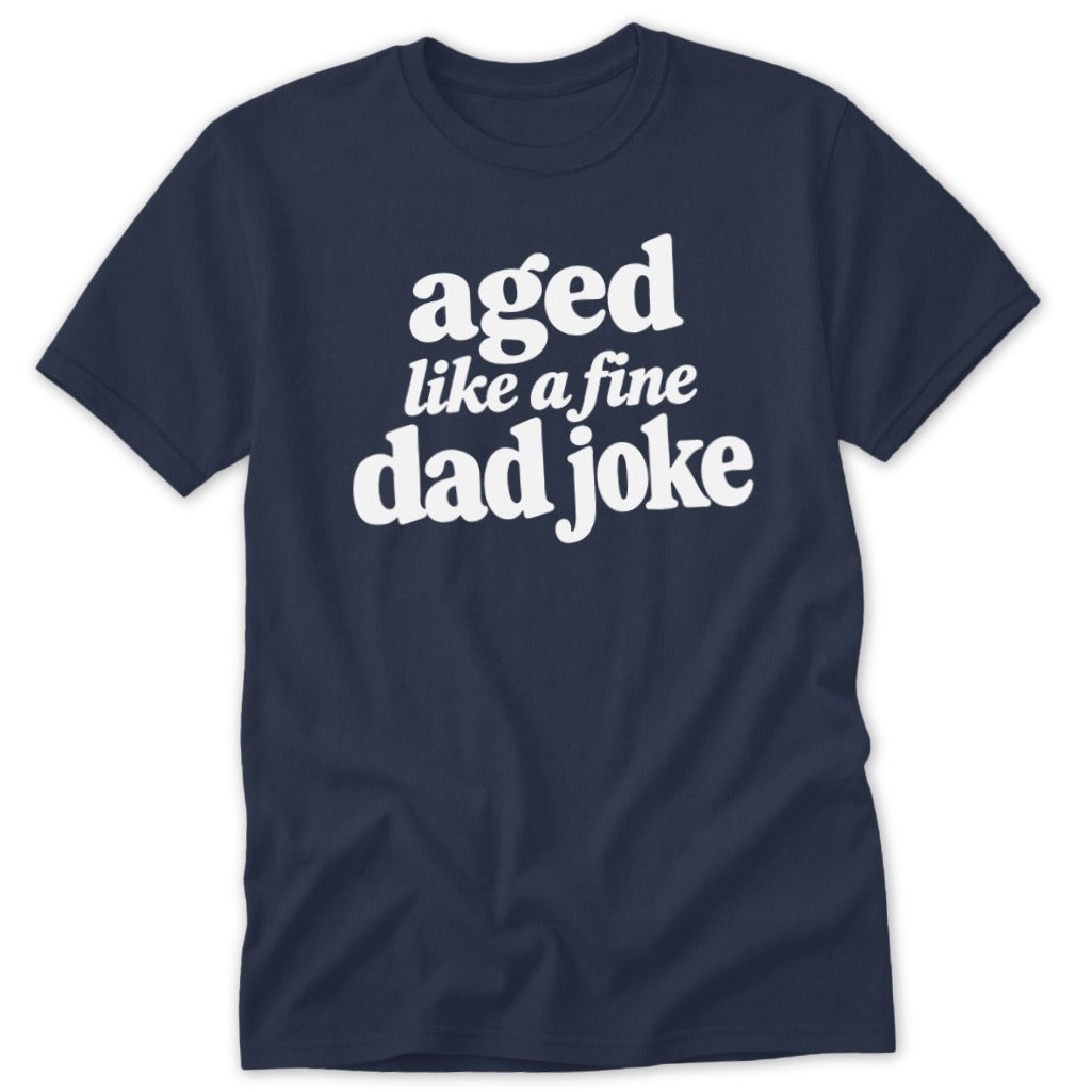 Navy blue t-shirt featuring the white text aged like a fine dad joke on the chest.