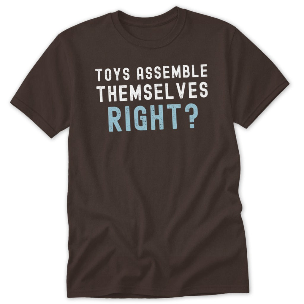 Brown t-shirt with white and blue text: "Toys Assemble Themselves Right?"