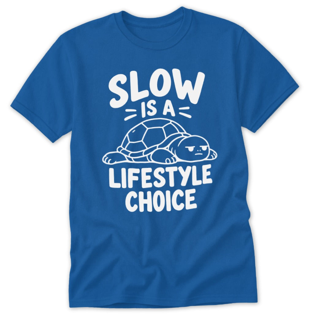 Blue t-shirt featuring white text reading "Slow is a lifestyle choice" alongside a cartoon turtle graphic.