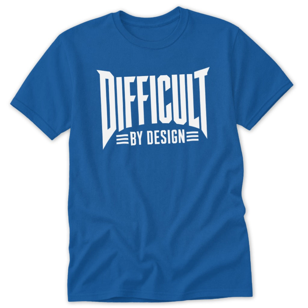 A blue short-sleeved crew neck t-shirt featuring the white text DIFFICULT BY DESIGN on the chest.