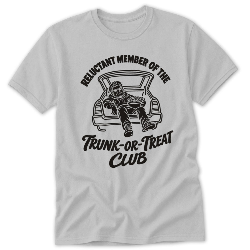T-shirt graphic: man in car trunk holding candy, text "Reluctant Member of the Trunk-Or-Treat Club."