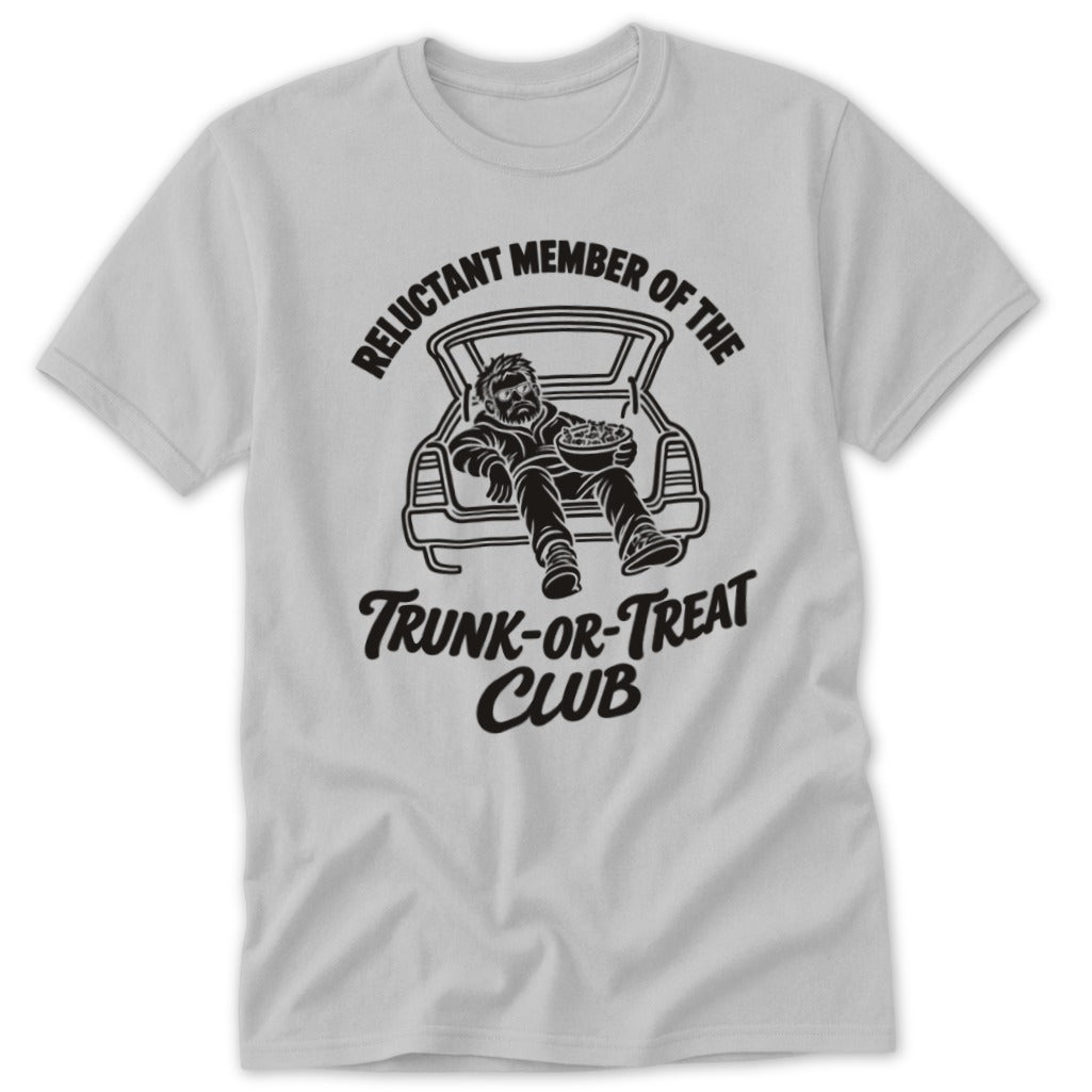 T-shirt graphic: man in car trunk holding candy, text "Reluctant Member of the Trunk-Or-Treat Club."